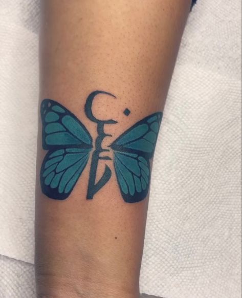 Arabic blue butterfly tattoo 🦋 Butterfly Arabic Tattoo, Arabic Butterfly Tattoo, Arabic Tattoo With Butterfly, Butterfly Tats, Blue Ink Tattoos, Butterfly Neck Tattoo, Blue Butterfly Tattoo, Girl Thigh Tattoos, Blue Tattoo