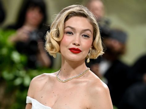 Gigi Hadid’s Bombshell Red Lip Was Thanks to This $10 Smudge-Proof Lipstick — Byrdie Gigi Hadid Red Lipstick, Gigi Hadid Red Lips, Types Of Beauty, Timeless Makeup, Ayo Edebiri, Smudge Proof Lipstick, Maybelline Lipstick, Bella Gigi Hadid, Maybelline Makeup