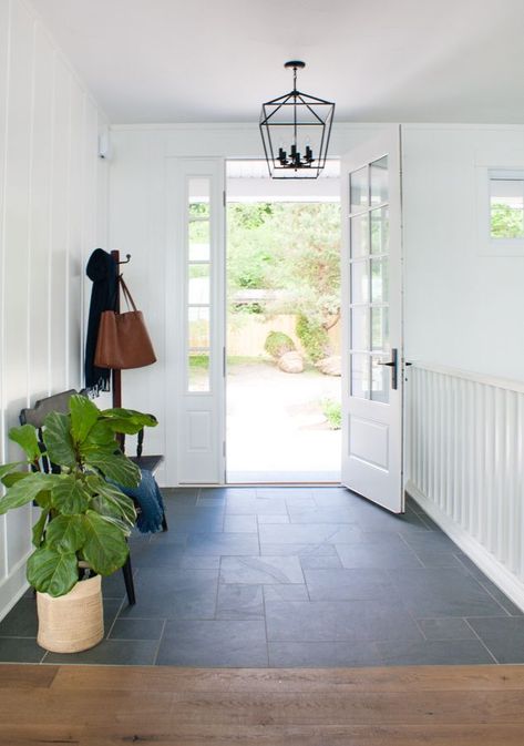 lake house with montauk blue slate tile in the entry, white board and batten walls and natural wood floors add to the cottage style Bamboo Flooring Living Room, Blue Slate Tile, White Board And Batten, Natural Wood Floors, Batten Walls, Modern Wood Floors, Entryway Tile, Foyer Flooring, Entryway Flooring