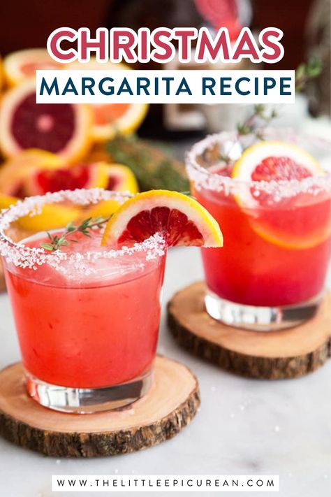 glasses of orange margarita with text overlay that reads Christmas margarita recipe Easy Flavored Margarita Recipes, Breakfast Margarita Recipe, Sanpellegrino Cocktails, Cranberry Orange Margarita, Flavored Margarita Recipes, Orange Margarita Recipe, Margarita Drinks, Holiday Margaritas, Christmas Margarita