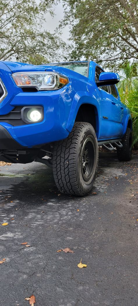 2020 SR5 Tacoma truck in Voodoo Blue. 3 x 2 inch leveling kit with 265/70/17 wheel upgrade. Fuel JM2 17 inch rims with Cooper Discoverer A/T tires. Blue Tacoma, Voodoo Blue, 17 Wheels, Tacoma Truck, Dream Garage, Future House, Tires, Dream Cars, Monster Trucks