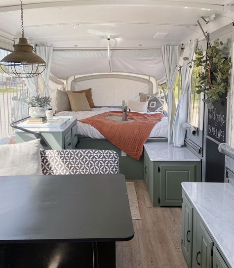 Renovated Jayco Camper, Green Trailer Interior, Rockwood Pop Up Camper Remodel, Pop Up Camper Before And After, Green Pop Up Camper Interior, Camper Pop Up Remodel, Pop Up Camper Makeover On A Budget, Redone Pop Up Camper, Painted Pop Up Camper Exterior