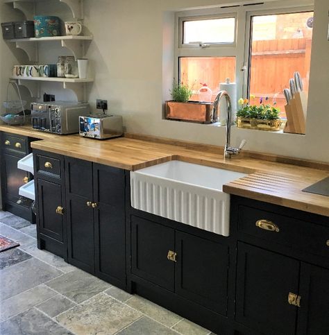 With so much light streaming into her kitchen Hannah could afford to go bold with her kitchen....and it's certainly paid off! Her base units are painted in Farrow and Balls 'black blue' and fitted with lovely shiny boho style cup handles and tiny cupboard locks.The  gorgeous Belfast sink - which we call a 'pie crust sink' makes a fantastic centre feature, - all topped with lovely warm waxed and waterproofed solid oak worktops Kitchen Worktop Ideas, Worktop Ideas, Oak Worktop, Oak Worktops, Belfast Sink, Spring Sunshine, Great Yarmouth, Freestanding Kitchen, Pine Furniture