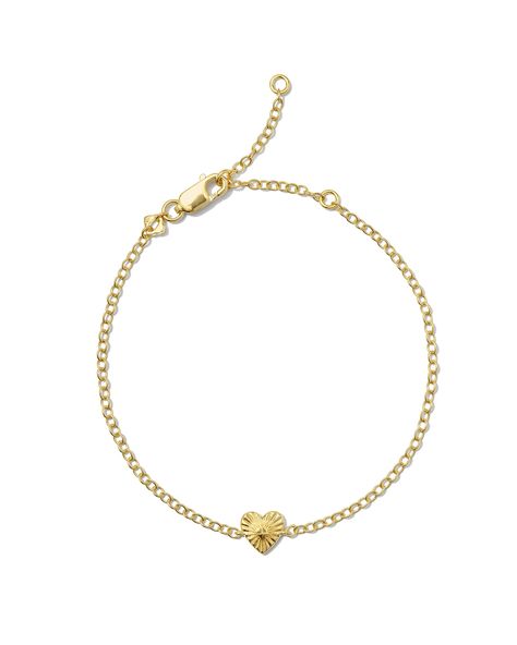 The Maia Heartburst Delicate Chain Bracelet in 18k Gold Vermeil may be dainty, but its artful design is hard to ignore. The carved heart shape is a play on traditional engraving techniques, giving this bracelet a gorgeous, hand-crafted look. Timeless in design and quality, this bracelet’s bound to become a regular fixture on your wrist stack. Metal 18k Gold Vermeil What is Vermeil? Vermeil (that’s pronounced ver-may) is a gold plating technique that dates back to the 19th century. While other je Yellow Gold Heart Bracelet With Adjustable Chain, Bsf Gifts, Dr Accessories, Wrist Stack, Preppy Tops, Descendants Dr, Cute Friendship Bracelets, Plating Techniques, Wrist Stacks