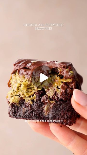 Rosie Brown on Instagram: "Pistachio Chocolate Brownie 🤎 (egg free + dairy free)   Inspired by the viral Dubai Chocolate Bar this brownie is rich and fudgey filled with pistachio butter and crispy toasted pastry pieces. Covered in a thick chocolate ganache drizzled with white chocolate this brownie is the definition of indulgence.  INGREDIENTS Brownie 150g dark chocolate (min 50% cocoa) 140g plain flour 200g caster sugar 50g light brown sugar 120g dairy / dairy free butter 120g dairy / dairy free milk 60g dark cocoa powder Filling 200g pistachio paste / butter 1 tbsp butter 200g filo pastry, shredded Topping 125g dairy free / dairy dark chocolate 100g dairy free / dairy double cream 50g dairy free / dairy white chocolate, melted INSTRUCTIONS Line and lightly grease a 15cm square baking tr Dubai Chocolate Cake, Pistachio Chocolate Cake, Pistachio Brownies, Dubai Cake, Dairy Free Butter, Pistachio Paste, Dubai Chocolate, Pistachio Chocolate, Cakes Design