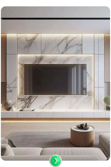 Modern marble TV wall with built-in lights, showcasing sophisticated textures and functional elegance for creating an impressive focal point in your home. Tv Wall Marble, Marble Tv Wall, Tv Wall Panels, Tiles Wall Design, Luxury Tv Wall, Tv Wall Panel, Wall Trends, Modern Marble, Tv Wall Design