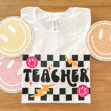 Excited to share this item from my #etsy shop: Teacher Checkered Tee, Adult Unisex Bella Canvas T-Shirt, White, Short Sleeve Shirt, Trendy Top, Retro, Gift, Teacher Mode, Back to School Teaching Hacks, Teacher Canvas, Teacher Fits, Cute Teacher Outfits, Teacher Clothes, School Spirit Shirts, Teaching Outfits, White Short Sleeve Shirt, Teaching Life