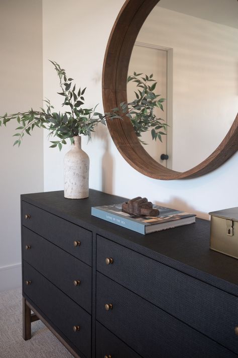 Woven black raffia offers a texture-driven take on bedroom storage. Antique brass-finished iron hardware adorns six spacious drawers, all supported by a solid mahogany base. Dimensions: 62.00"w x 17.00"d x 34.00"h Shipping is available for this item.Have questions? Visit our FAQ page. Room With Black Dresser, Black Dresser Decor Ideas, Black Mirror Over Dresser, Dark Dresser Decor Bedroom, Makeover Bedroom Furniture, Black Wooden Furniture Bedroom, Decor On Bedroom Dresser, Bedroom Dresser Black, Black And Brown Furniture Bedroom