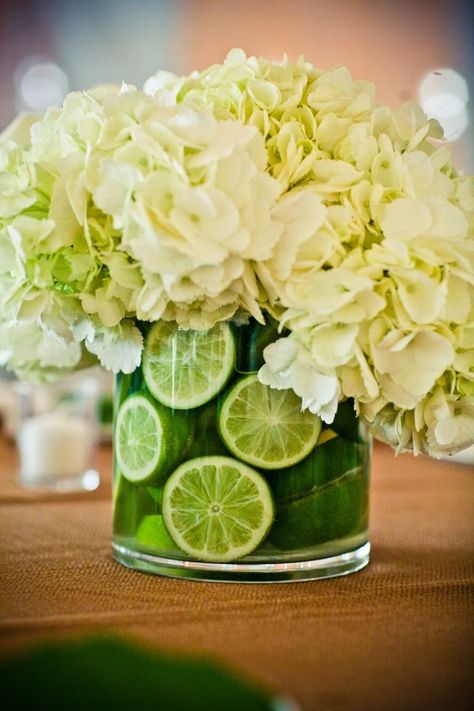 Hydrangea-Centerpiece - I like the limes inside, I am digging the fruit, kind of like the granny smith apples in some of the other center pieces... Are granny smith fall apples??? Lime Centerpiece, Hydrangea Season, Deco Fruit, Bouquet Champetre, Fruit Centerpieces, Hydrangea Centerpiece, Deco Nature, Fruit Decorations, New Fruit