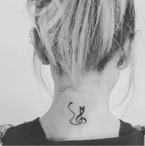 56 Cat Tattoos That Will Make You Want to Get Inked – SheKnows Piano Tattoos, Geometric Tattoo Music, Musical Tattoos, Tatoo 3d, Cat Tattoo Simple, Unique Small Tattoo, Back Of Neck Tattoo, Music Tattoo Designs, Creative Juice