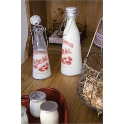 Milk bottles - red Milk Jars, Country Kitchen Accessories, Old Milk Bottles, Napa Style, Milk Man, Vintage Milk Bottles, Vintage Style Home, Milk Jar, French Glass