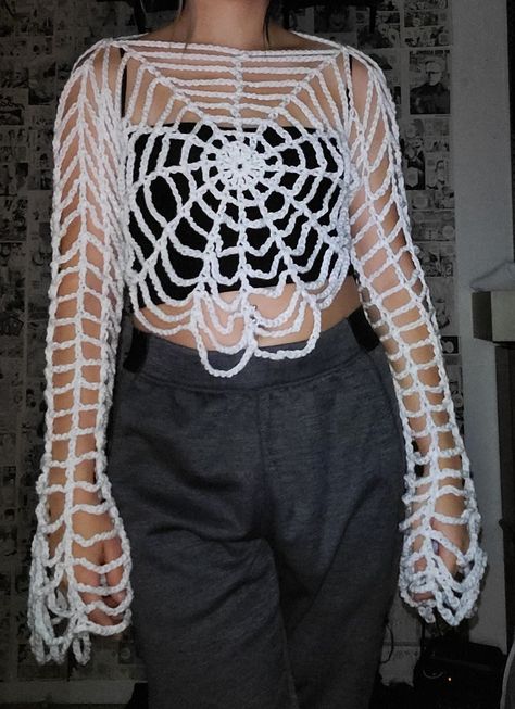 Meticulously handmade crochet spider web top, featuring captivating bell style sleeves. This unique piece is perfect for spooky season. For a personalized touch such as short, long, or bell sleeves, as shown in the photos or different colors feel free to message me. Crochet Spider Costume, Spider Web Shirt Crochet, Crochet Spider Web Shrug, Crochet Spider Web Dress, Crochet Holey Sweater, Spider Web Clothing, Crochet Spider Web Gloves, How To Crochet A Spider Web, Crochet Spider Web Top Pattern Free