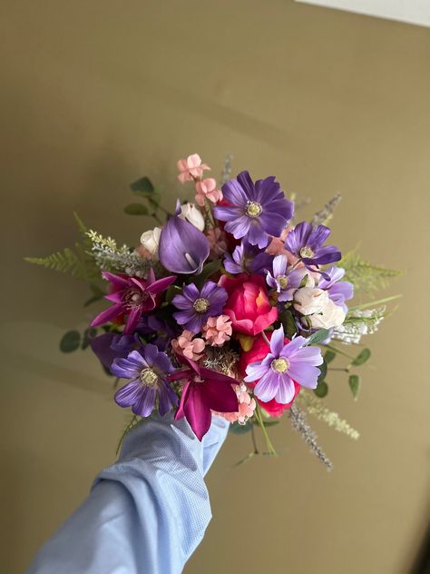 "This romantic silk wedding bouquet is made from faux purple cosmos and hot pink peonies, silk eucalyptus, faux ferns. It will make the perfect addition to your big day!  The stems are wrapped in twine. The bouquet pictured is 10\"  Matching bridesmaids bouquets, toss bouquet, corsages and boutonnières and other accessories are available." Purple And Pink Flower Bouquet, Light Pink And Purple Bouquet, Purple Dress Bouquet, Pink And Purple Prom Bouquet, Pink And Purple Bridal Bouquet, Prom Bouquet Purple Dress, Prom Flowers Bouquet Purple Dress, Prom Bouquet Ideas Purple, Purple Prom Bouquet