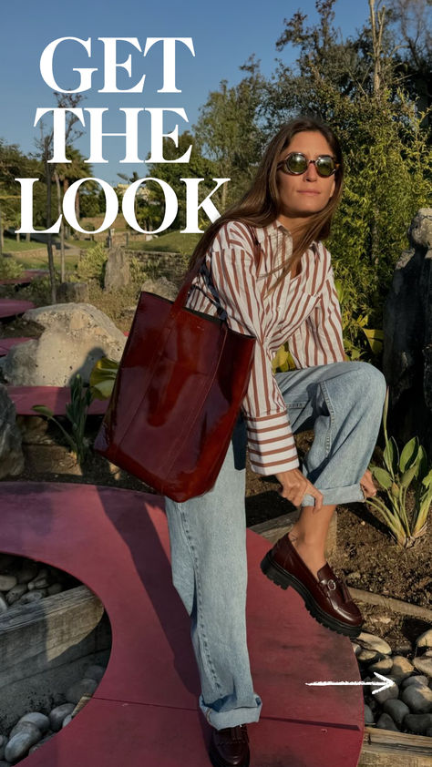 Recreate this effortless Parisian style with Sézane’s Bilma striped shirt, paired perfectly with wide-leg jeans and classic Albane loafers. Complete the look with The Tote in Mahogany and Romie sunglasses for a chic, timeless ensemble. Check out this French-inspired outfit and more at sezane.com or via the app. Sezane Outfit Ideas, Parisian Style Winter Chic, Sezane Style, Sezane Outfit, Parisian Style Winter, French Inspired Outfits, Parisian Style Outfit, Thanksgiving Outfit Ideas, Fall Layering