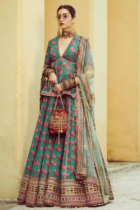 peplum style blouse with a lehenga Sabyasachi Blouses, Long Blouse Designs, Lehenga Blouse Designs, Wedding Blouse Designs, Casual Indian Fashion, Traditional Indian Outfits, Indian Bridal Outfits, Indian Dress, Embroidered Tulle