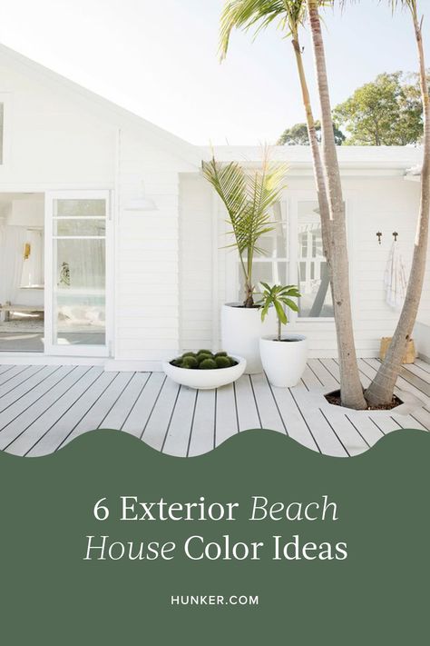 Among home exterior ideas, there are few as fun to fantasize about as exterior beach house colors like turquoise, bright white, and pink. #hunkerhome #beachhouse #beachhouseideas #beachhousedecor Beach Exterior House Colors, Exterior Beach House Colors, Beach House Exterior Paint Colors, Coastal Exterior House Colors, Coastal Beach House Exterior, House Color Ideas, Coastal Homes Exteriors, Beach Bungalow Exterior, Beach House Exterior Colors