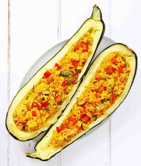 Spanish rice stuffed marrow, also known as over grown zucchini Marrow Recipes, Stuffed Marrow, Vegetable Marrow, Marrow Recipe, Veggie Board, Zucchini Stuffed, Spanish Rice Recipe, How To Cook Chorizo, Rice Stuffing