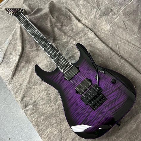 This ESP USA M-II NTB FR in Dark Purple Sunburst with matching binding will be headed to @guitarcenter and features stainless steel frets, Floyd Rose Original locking bridge and nut, EMG pickups, Sperzel locking tuners, and Dunlop strap locks Purple Bass Guitar, Guitar Purple, Purple Guitar, Lock Bridge, Esp Guitars, Black Electric Guitar, Guitar Ideas, Dream Future, Floyd Rose