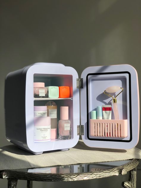 pink skincare fridge with glow recipe products inside. Mini Fridge For Makeup, Mimi Skincare Fridge, Skin Care Holder Aesthetic, Makeup Fridge Aesthetic, Mini Frigerator Organization Skincare, Skin Care Refrigerator, Skin Care Fridge Aesthetic, Skincare Fridge Aesthetic, Makeup Refrigerator