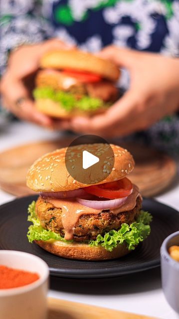 TARNEET KAUR on Instagram: "✨ Chickpea Burger ✨

If you are bored of the same regular boring burgers, then try this one. 
Its flavourful, delicious and so much better 😍

* In a bowl, mash 1 cup Boiled chickpeas, 1 small onion (finely chopped), a bunch of coriander (roughly chopped), 1/4 cup bread crumbs, 1/4 cup Peanut Butter some spices (salt, red chilli powder, jeera powder, dhaniya powder) and some lemon juice. Mix everything. 
* Grease your hands with some oil and shape the patty according to the size of the burger bun. Then shallow fry them on medium heat till crispy (if it breaks, try adding some soaked poha)
* For the sauce, mix 1/2 cup Hung Curd, with some red chilli sauce, honey, salt & pepper. You could also add some oregano and chilli flakes here. 
* Then assemble your burger a Chickpea Patty, Veg Burgers Recipe, Red Chilli Sauce, Burger Bun, Chickpea Burger, Instagram Recipes, Red Chilli Powder, Buns Recipe, Bun Recipe