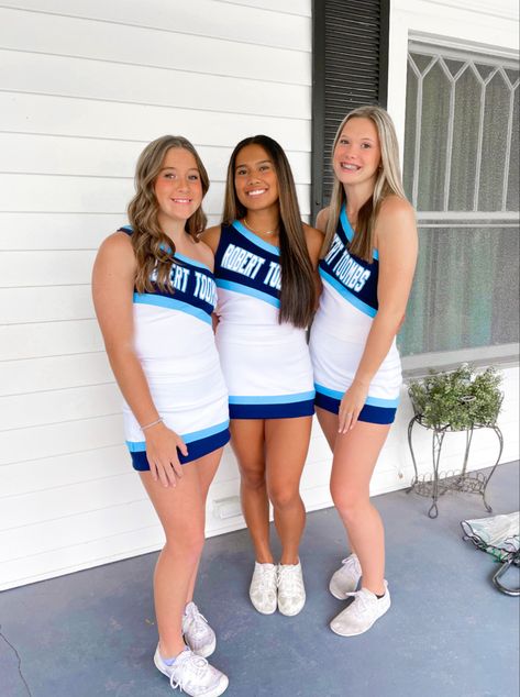 One Shoulder Cheer Uniform, White Cheer Uniforms High Schools, Highschool Cheer Pictures, Cheer Uniform High School, High School Cheer Uniforms, School Cheer Uniforms, Cheerleading Picture Poses, White Forces, Cheerleading Photos