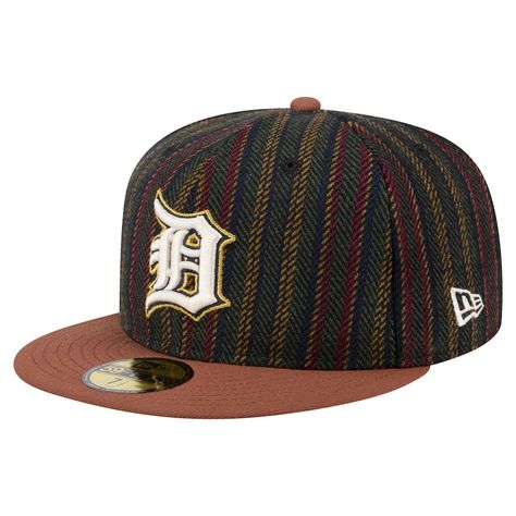 Complete your Detroit Tigers game day look with this New Era Vintage Herringbone 59FIFTY Fitted Hat. The high crown and structured fit of this Detroit Tigers cap offer a classic and comfortable feel, while the herringbone pattern adds a touch of vintage flair. With the iconic 59FIFTY fitted design, this hat offers a timeless look that celebrates the team's storied history.