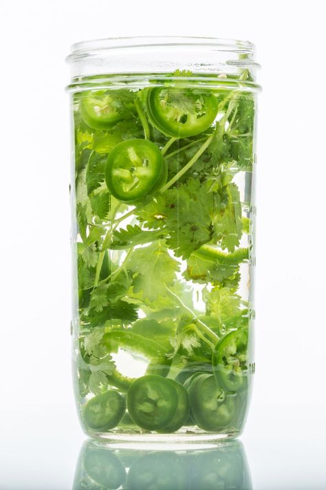 Cilantro and Jalapeno Infused Tequila Jalapeno Infused Tequila, Infused Alcohol Recipes, Event Drinks, Apple Pie Moonshine Drinks, Tequila Drinks Easy, Infused Tequila, Infused Liquors, Summer Vodka Cocktails, Tequila Recipe