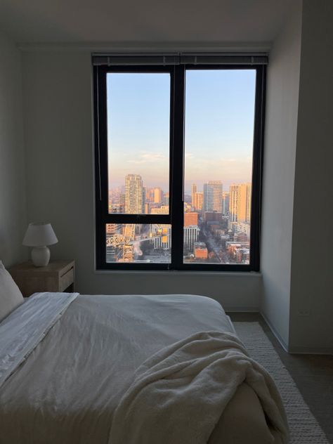 nyc apartment.  chicago apartment. asthetic bedroom. cloud bed. simple bedroom. simple apartment. clean apartment. white home decor. simple home decor Nyc Apartment Realistic, Simple Apartment Aesthetic Minimalist, Bedroom With City View, Dream Apartment Nyc, Apartment Chicago, Apartment With Boyfriend, Clean Apartment, Nyc Bedroom, Simple Apartment