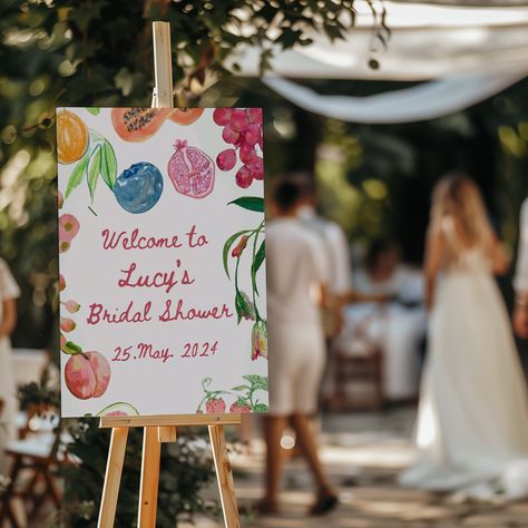 Fresh Off The Market Bridal Shower Welcome Sign ~ Canva Template Celebrate the bride-to-be with our "Fresh Off the Market" bridal shower theme, inspired by the vibrant charm of a bustling farmer's market. This theme brings a fresh and lively atmosphere to the celebration, featuring an abundance of seasonal blooms, colorful fruits, and artisanal treats. Picture tables adorned with rustic crates overflowing with fresh produce, wildflowers in mason jars, and charming chalkboard signs. Guests can savor farm-to-table delights, sip on refreshing lemonade or handcrafted cocktails, and enjoy the relaxed, inviting ambiance. Please read before purchase: This is a fully editable, do-it-yourself Canva Template. You will access and edit a pre-made template and prepare your own print files. No physical Artsy Bridal Shower Ideas, Fruit Bridal Shower Theme, Market Bridal Shower Theme, She’s Off The Market Party, April Bridal Shower Ideas, Berry Bridal Shower Theme, June Bridal Shower Ideas, Bridal Shower She’s Off The Market, Fresh Off The Market