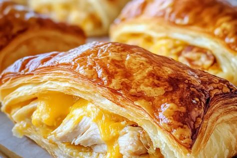 This Chicken and Cheese Puff Pastry recipe is easy to make and bursting with flavor. Flaky, golden pastry filled with tender chicken and cheese. Puff Pastry Recipes With Chicken, Chicken Phyllo Recipes, Chicken Pie Recipe Easy Puff Pastries, Chicken Puff Pastry Recipes, Chicken Puff Pastry, Chicken And Pastry, Puff Pastry Chicken, Cream Cheese Puff Pastry, Chicken Puffs