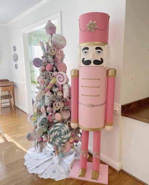 Are you decorating your front porch for Christmas? We're sharing over 25 ideas for inspiration this holiday season. From the most gorgeous garland to the most unique DIY nutcrackers, you'll be sure to find ideas you can replicate on your own front porch for the holidays! Porch Christmas Lights, Pink Nutcracker, Nutcracker Decor, Nutcracker Christmas Decorations, Hanging Christmas Lights, Halloween Porch Decorations, Porch Christmas Decor, Front Porch Christmas, Christmas Front Porch