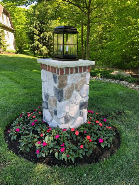 Finally we're thinking SPRING 🌷 Have you planted your flowers for the season yet? #madeinusa #curbappeal #homedecor #exteriordesign #howyouhome #architecturaldigest #lightingdesign #outdoorlighting #homeinspo  #homeinspiration  #homeideas #designinspiration #homeexterior #remodeling #TowerLighting #outdoorliving #outdoorspace #luxurydetails #frontporchliving #frontporchdecor #instadesign #lightingstyle #exteriorsofinstagram #thinkspring #postlights #plantflowers #lantern #homebeautful Brick Pillars, Driveway Entrance Landscaping, Driveway Lighting, Outdoor Lamp Posts, Tower Light, Lantern Post, Home Garden Design, Home Landscaping, Flowers Wallpaper