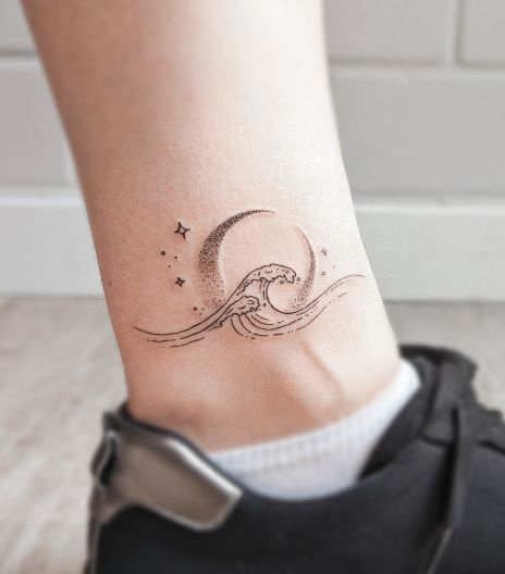 Ocean Wave Mini Tattoos Of Moon And Stars Crescent Moon And Waves Tattoo, Water Tattoo Ideas Simple, Star And Ocean Tattoo, Wave With Moon Tattoo, Moon And Ocean Tattoo Designs, Moon And Water Tattoo Designs, Sun Moon Stars Ocean Tattoo, Sun Moon Sea Tattoo, Ocean And Stars Tattoo