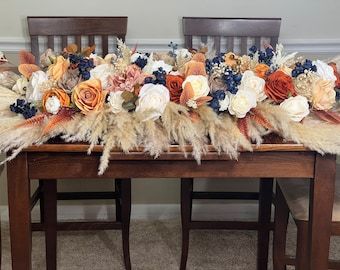 Navy Terracotta Wedding Table, Navy And Rust Wedding Table Decor, Navy Blue And Burnt Orange Wedding Centerpieces, Navy Blue And Terracotta Wedding Centerpieces, Burnt Orange And Blue Wedding, Rust And Navy Blue Wedding, Navy Blue And Terracotta Wedding, Arch Flowers, Centerpiece Table