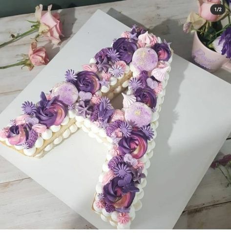 How To Make Alphabet Cake At Home - Wondafox Number Cakes Ideas, Alphabet Cake Design, Alphabet Birthday Cake, Cupcake Letter Cake, Alphabet Cake Birthday Letters, Number Cakes Purple, Purple Number Cake, Letter A Cake, Purple Letter Cake