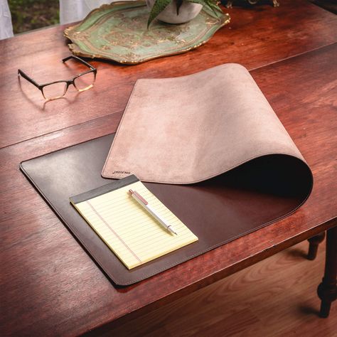 This new rolled mat is designed to fit a wider desk or to be the centerpiece/runner for a conference room table. The no core design is rollable for storage but also makes it lightweight with a low profile. It's the perfect way to help organize your office or boardroom. #homeoffice #home #office #work #workfromhome #leather #desk #accessories #officeaccessories  #deskpad #protection #deskmat #officedecor #protect #elegant #rollable Leather Desk Mat, Emerald Bedroom, Men’s Office, Leather Desk Accessories, Leather Desk Pad, Core Design, Winter Photoshoot, Leather Desk, Leather Roll