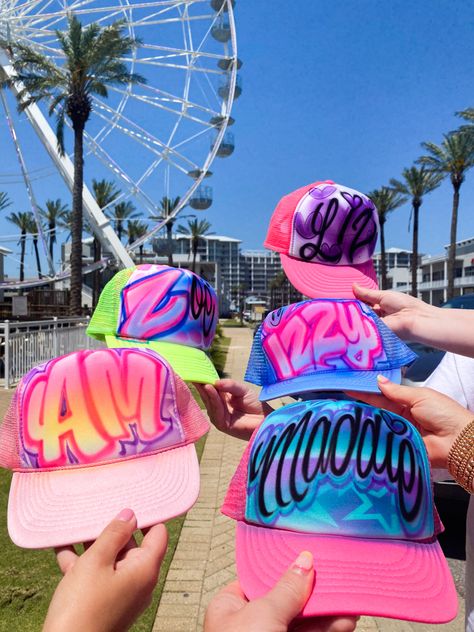 Tailgate Tea, Painting Trucker Hats, Trendy Multicolor Trucker Hat For Festival, Hand Painted Trucker Hats Diy, Fun Multicolor Trucker Hat For Beach, Spray Paint Trucker Hats, Airbrush Hats Design, Airbrush Hat Ideas, Airbrushed Trucker Hats