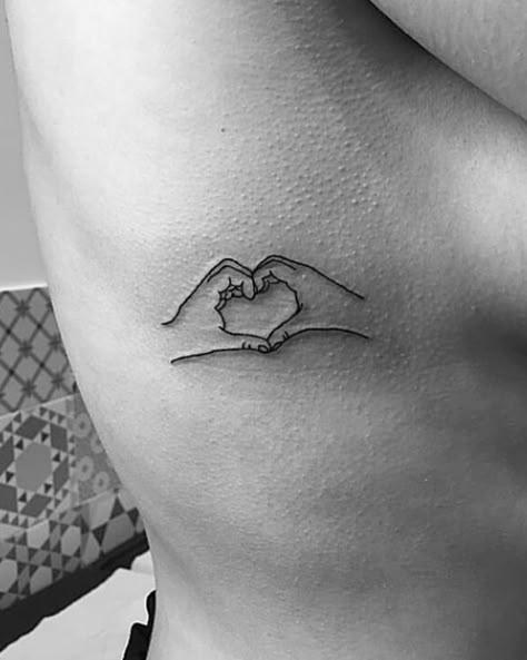 Small Holding Hands Tattoo, Heart And Hands Tattoo, Giving Hands Tattoo, Half Heart Hand Tattoo, Heart Shaped Hands Tattoo, Heart Hands Tattoo Design, Love Heart Hand Tattoo, Hands Making Heart Tattoo, Heart Friendship Tattoos