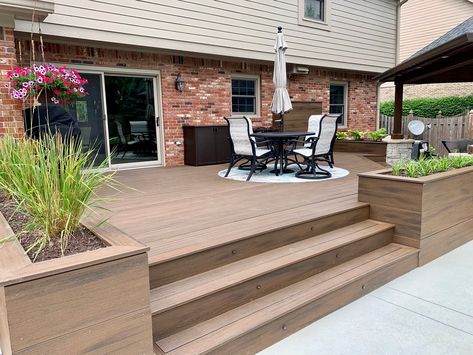 8 Things to Consider When Building a Ground-Level Deck Composite Deck With Pergola, Low Deck Designs, Trex Deck Designs, Deck Around Trees, Concrete Deck Blocks, Small Backyard Decks, Composite Decks, Ground Level Deck, Yard Remodel