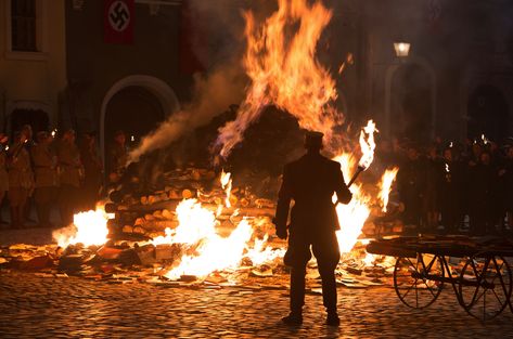 Liesel watches the works of literature burn. She later steals from the pile, making her the book thief. Book Burning, Book Thief, Markus Zusak, Fahrenheit 451, Writing Fantasy, The Book Thief, Levels Of Understanding, Historical Novels, Hd Desktop