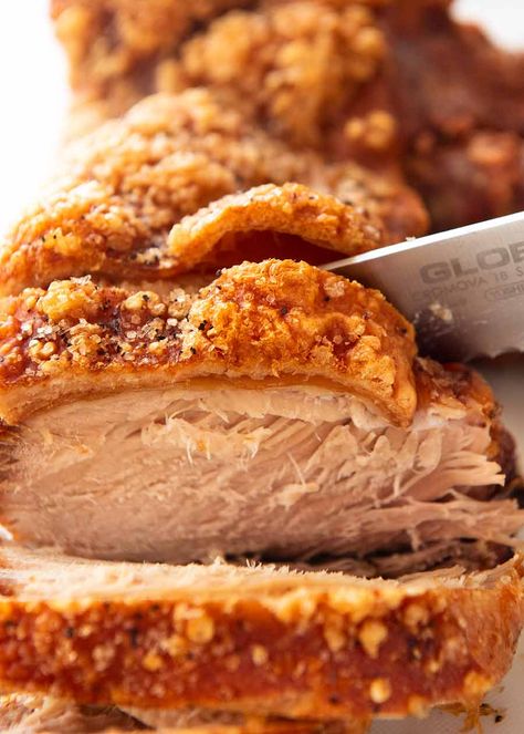 Close up slicing perfect pork roast with crispy crackling Pork Loin With Crackling Recipes, Crispy Pork Shoulder Roast In Oven, Crispy Pork Loin, Leg Of Pork Roast Recipe, Pork Leg Roast Recipes, Crispy Pork Shoulder, Crispy Roast Pork, Crackling Recipe, Roast Pork Shoulder