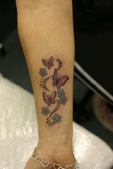 butterflies and flowers tattoo on wrist - 50+ Amazing Butterfly Tattoo Designs | Art and Design Tattoos For Women On Thigh, Wrist Tattoos Girls, Tato Flash, Butterfly With Flowers Tattoo, Butterfly Wrist Tattoo, Butterfly Tattoo On Shoulder, Petit Tattoo, Cool Wrist Tattoos, Flower Wrist Tattoos