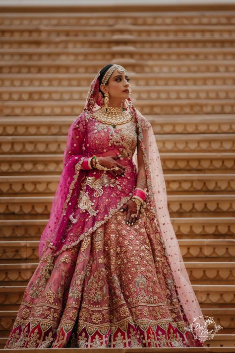 Royal Jaisalmer Wedding With A Dusty Pink Bridal Lehenga Royal Wedding Lehenga, Day Wedding Lehenga Indian Bridal, Royal Look Bridal Lehenga, Bridal Lehenga Designs Latest Pink, Unique Bridal Lehenga Designs, Pink And Red Wedding Lehenga, Pink And Red Lehenga Bridal, Dusty Pink Lehenga, Fuschia Bridal Lehenga