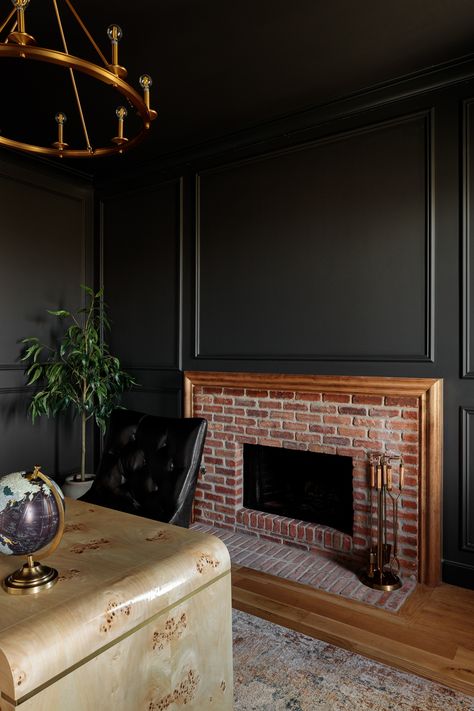 Moody Fireplace Built Ins, Brick Fireplace With Black Built Ins, Dark Moody Living Room, Red Brick Fireplace, Moody Office, Red Brick Fireplaces, Academia Room, Moody Living Room, Black Fireplace