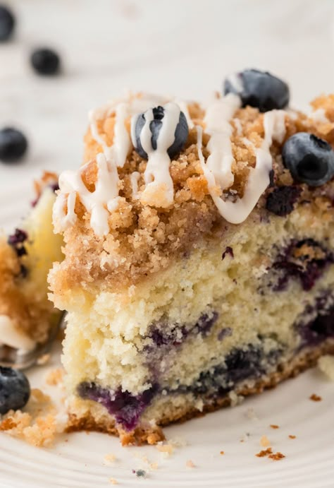 A slice of the cake with a bite taken out of the front. Blueberry Coffee Cake Recipe, Pecan Coffee Cake, Blueberry Crumb Cake, Blueberry Buckle, Cream Cheese Coffee Cake, Blueberry Breakfast Cake, Blueberry Coffee Cake, Blueberry Coffee, Sour Cream Coffee Cake