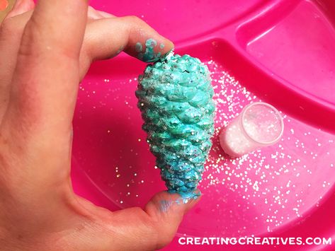 DIY Mermaid Ornament made from Pinecones - Creating Creatives Mermaid Christmas Decorations, Diy Mermaid Ornament, Mermaid Ornaments Diy, Diy Beach Ornaments, Mermaid Diy Decorations, Diy Mermaid Decor, Mermaid Diy Crafts, Disney Christmas Diy, Mermaid Christmas Tree