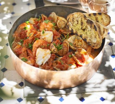 Mediterranean fish stew with garlic toasts Heart Foundation Diet, Garlic Toasts, Mediterranean Fish Stew, Garlic Toast Recipe, Mediterranean Fish, Seafood Stew, Fish Stew, Bbc Good Food, Bbc Good Food Recipes