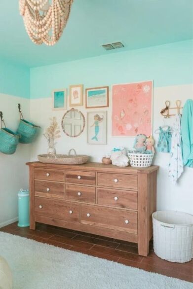 baby girl nursery ideas (4) Girl Beach Nursery, Girl Ocean Nursery, Boho Beach Nursery Girl, Baby Girl Nursery Beach Theme, Baby Girl Ocean Nursery, Pink Ocean Theme Nursery, Rainbow Mural, Pink Crib, Pineapple Theme