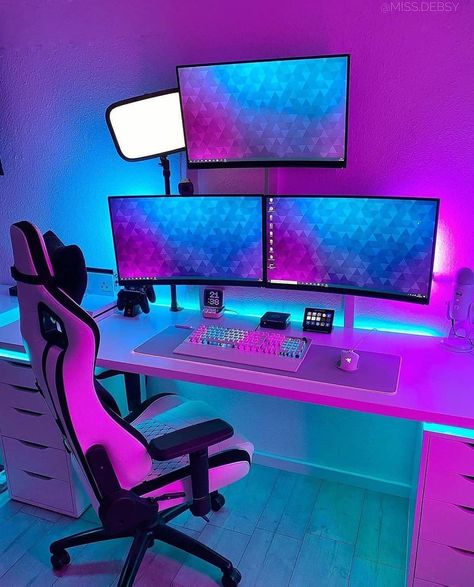 What do you think about this RGB theme? 🤔 [via @miss.debsy] This is a clean triple monitor setup! She is using an Ikea desk with Alex drawers and spacers for extra leg room. The gaming chair matches well with the white overall theme. All three monitors are mounted which saves previous desk space. I like the placement of the third monitor directly above the desk. She is using a Roccat keyboard and a Razer mouse accompanied by an extra-large RGB mousepad. Other gear on the desk includes, a Blue Gaming Loft Beds, Gaming Area Under Loft Bed, Loft Bed With Gaming Desk, Gamer Bed Rooms Ideas, Loft Gaming Bed, Gaming Setup Under Bed, Under Bed Gaming Setup, Loft Bed With Gaming Area, Gaming Setup Under Loft Bed