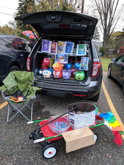 Inside Out Trunk for Trunk or Treat 40 metallic balloons Clear packing tape Printed images of characters and movie Hand painted plastic pumpkins Wagon decorated as Bing Bong's friend Truck Or Treat Inside Out, Inside Out Halloween Trunk Or Treat, Trunk Or Treat Ideas Bluey, Inside Our Trunk Or Treat, Trunk Or Treat Ideas Inside Out, Inside Out 2 Trunk Or Treat Ideas, Inside Out Trunk Or Treat Theme, Inside Out 2 Trunk Or Treat, Inside Out Trunk Or Treat Ideas For Cars